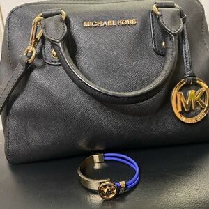 Michael Kors Black Bag with Gold Accents free MK bracelet included 11”W/7”H